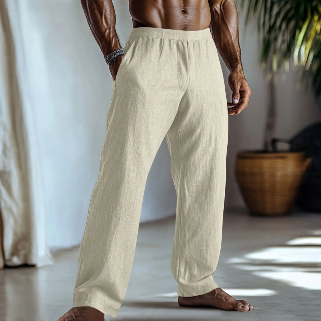 Cotton and linen straight-leg trousers in light green colour with multiple pockets, showing British style design.