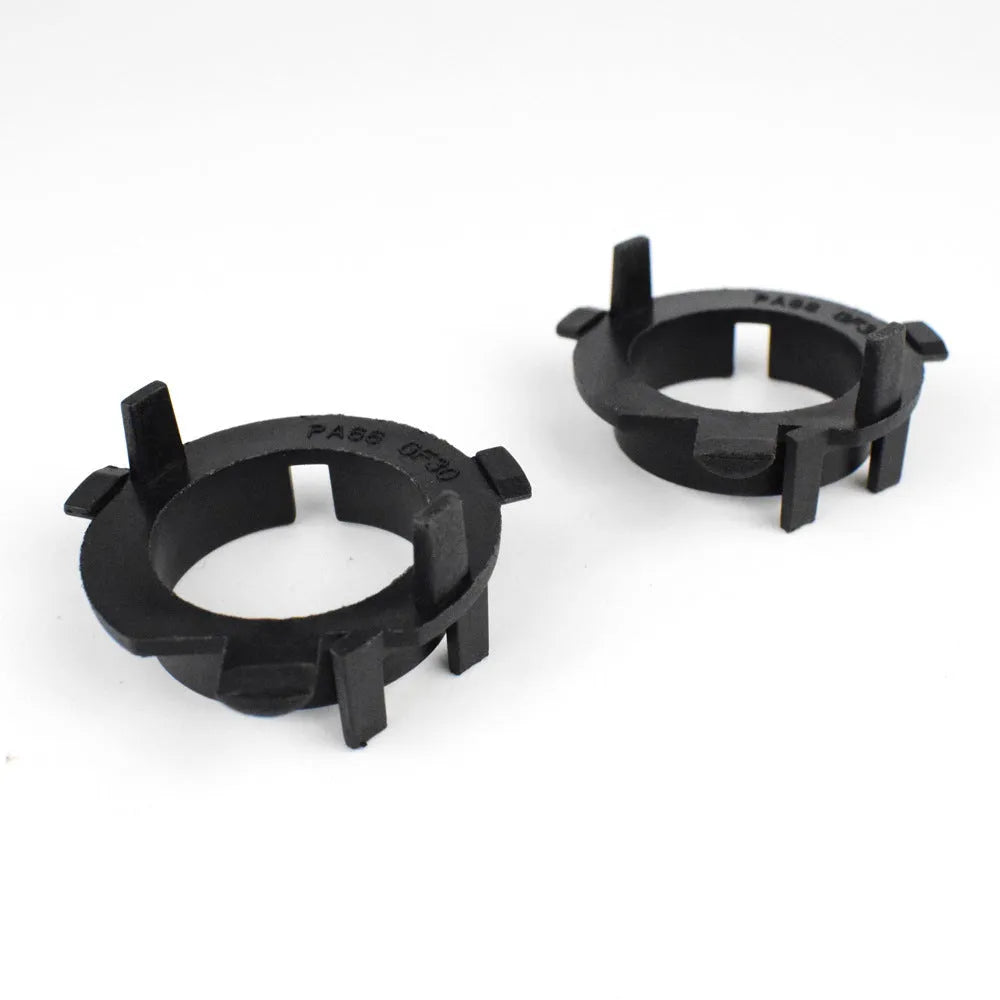 Black ABS plastic headlight adjustment card holder for compatible car models.