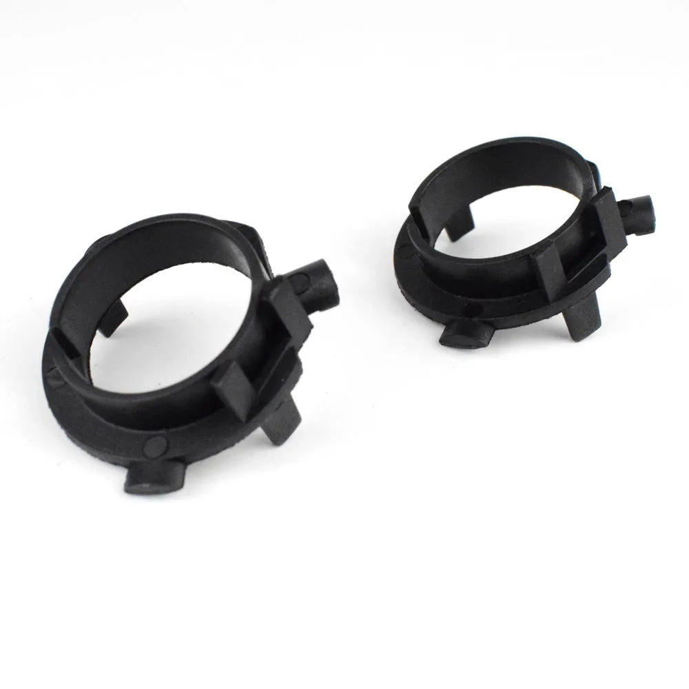 Black ABS plastic headlight adjustment card holder for compatible car models.
