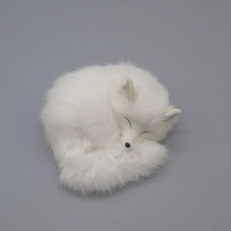 Small white artificial fox fur ornament for car or home decoration.
