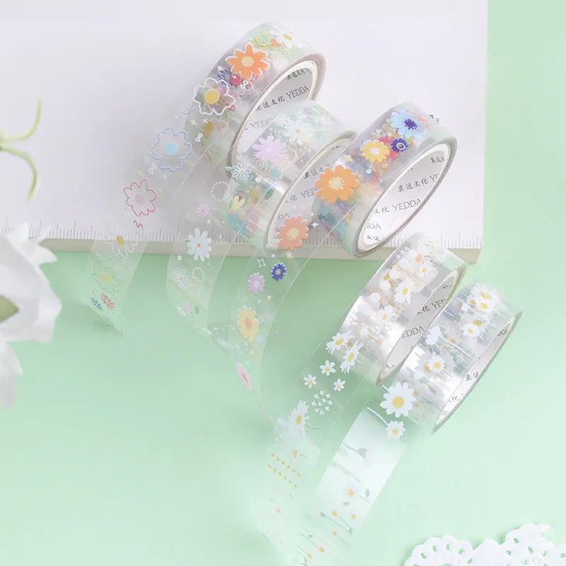 Five rolls of transparent adhesive tape with Midsummer Daisy decorative edge on clear PET polyester base