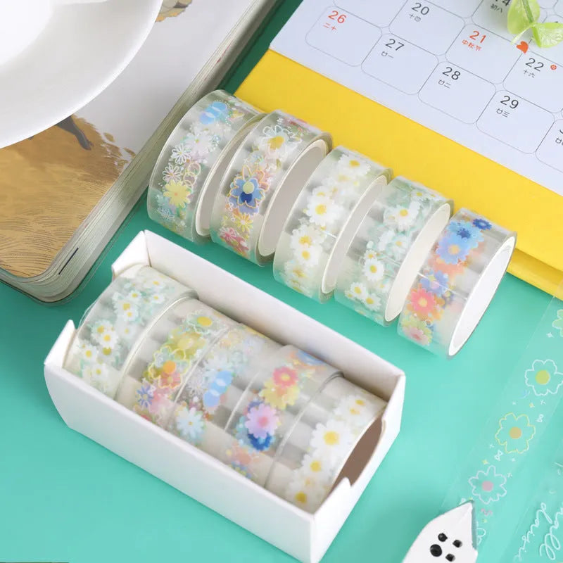 Five rolls of transparent adhesive tape with Midsummer Daisy decorative edge on clear PET polyester base