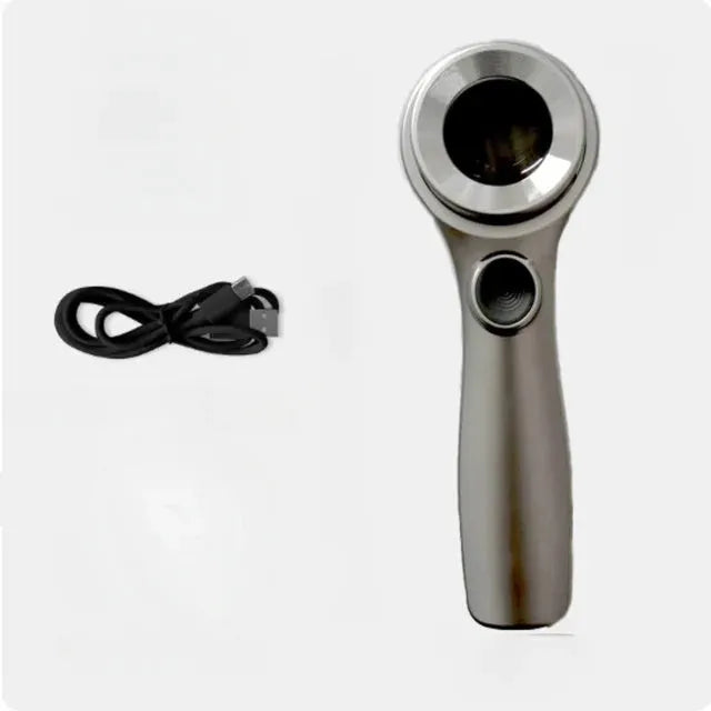 Black and silver jewellery appraisal magnifying glass with optical glass lens and USB-C cable on a table.