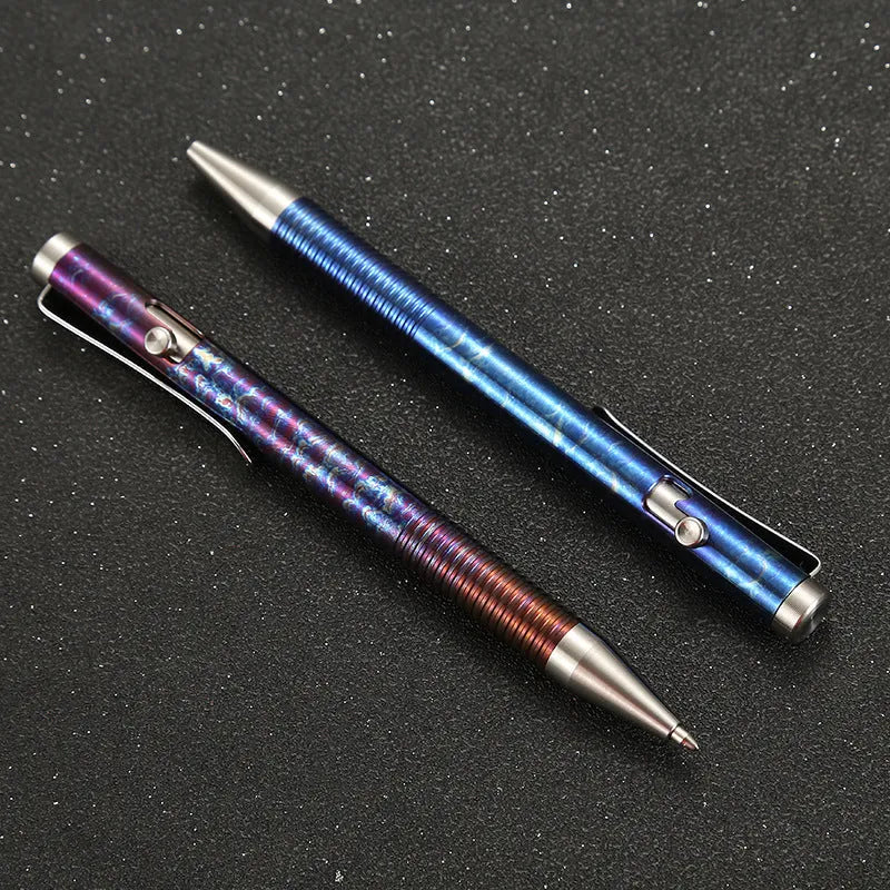 Titanium alloy bolt action pen with a colourful phantom finish and a gun-style bolt handle.
