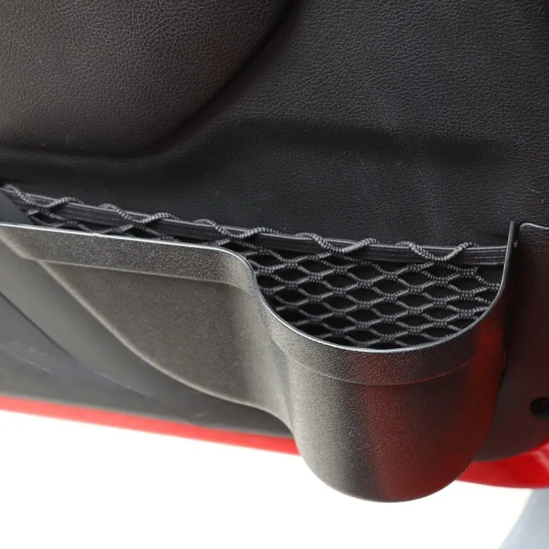 A pair of black aluminium alloy car interior storage boxes with net pockets for organising small items.
