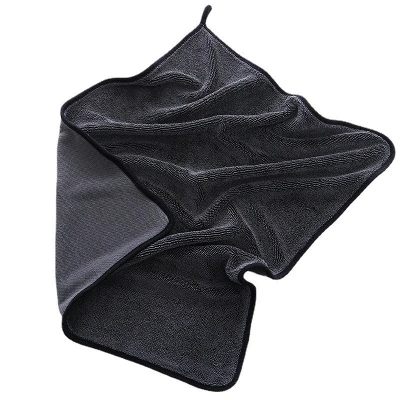 Grey car cleaning and pet bath towel with black hemmed edge, shown with a selection of different size options.