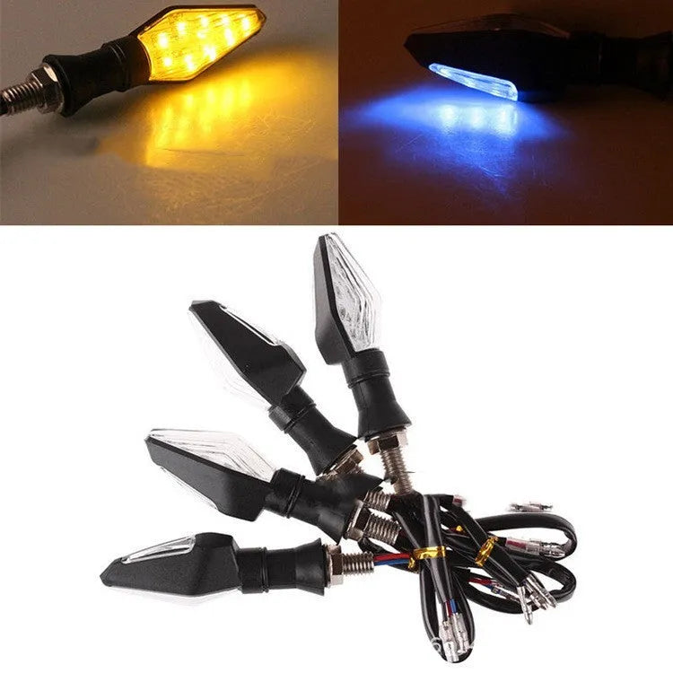 Motorcycle turn signal lights with plastic LED construction showing yellow and blue illumination
