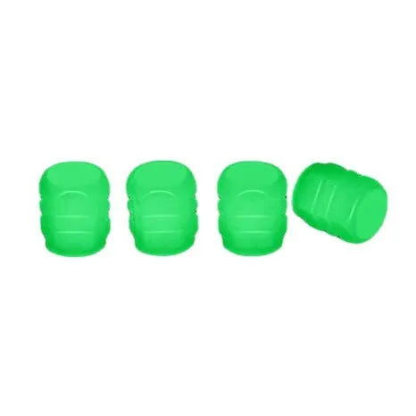 Pack of luminous rubber tyre valve caps glowing in green, blue, red, yellow, and pink colours.