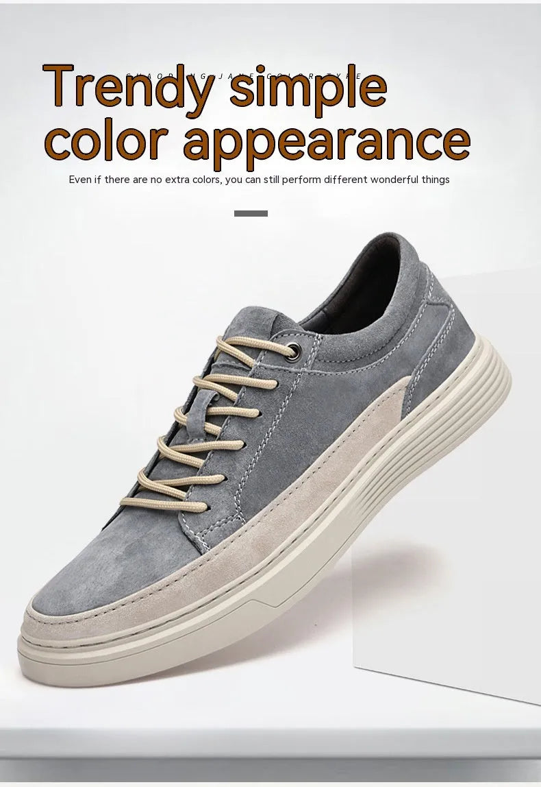 Men's grey casual skate shoes with pigskin upper and rubber sole showing lace-up front and round toe design