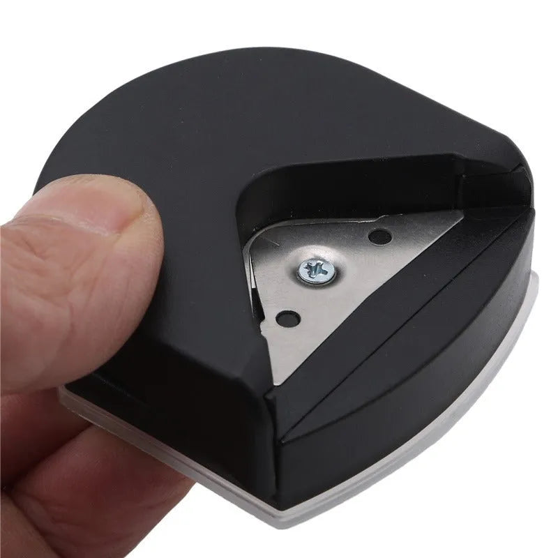 Business card corner cutter tool in black, blue, or pink with plastic and metal construction