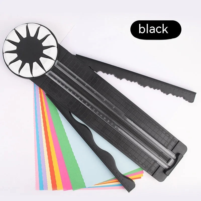 Pink and black 12-in-1 paper cutter with dotted plastic surface measuring 46.2cm