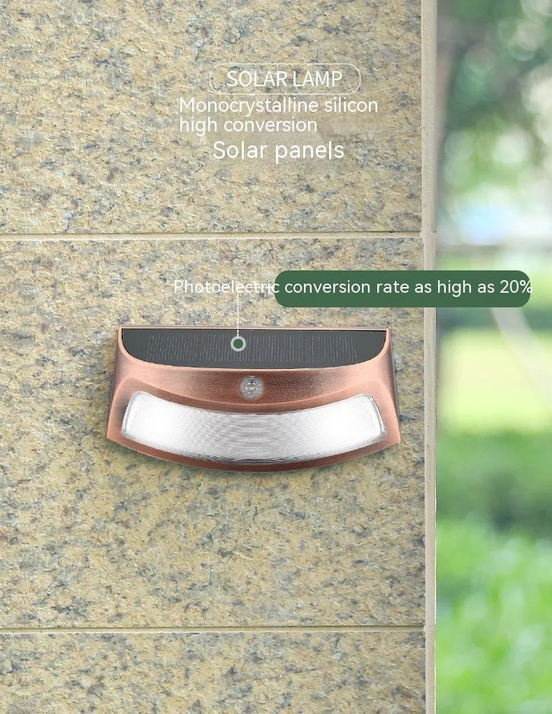 Solar outdoor wall lamp with smiling face design measuring 153x76x38mm for garden lighting