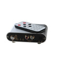 Silver aluminium alloy audio source switcher unit with front-panel switch button and infrared remote control.