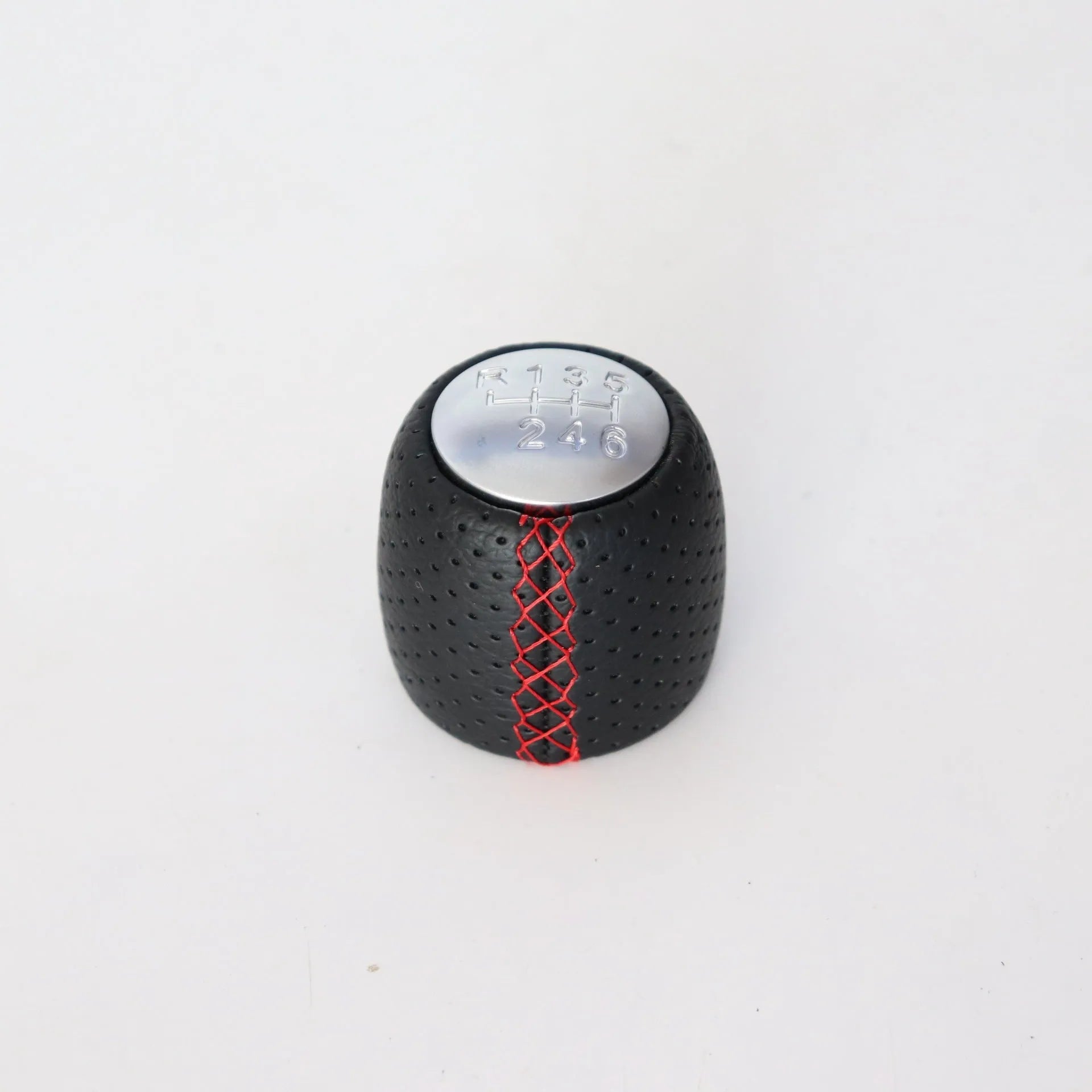 Sewn wrapped leather perforated handball gear for Alpha vehicles in matte and silver finishes