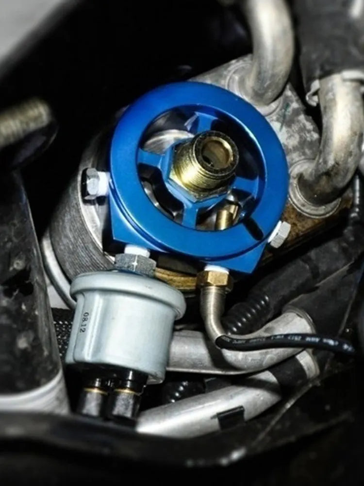 Universal aluminium oil pressure gauge adapter shown in red, blue, black, gold, and silver colour options.