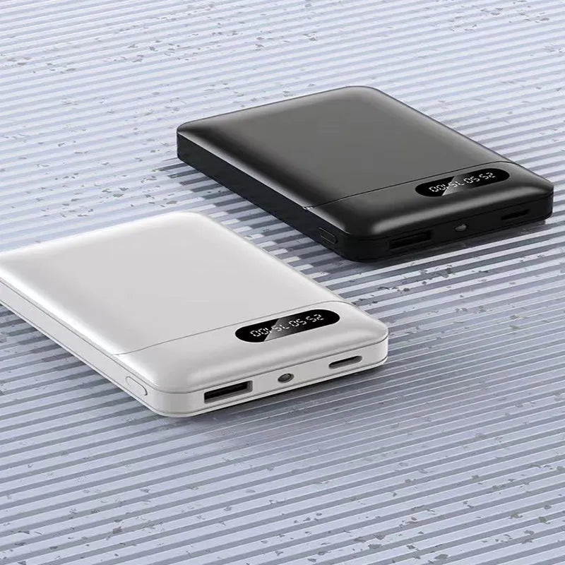 White portable power bank showing dual USB ports and compact 92x63x23mm dimensions