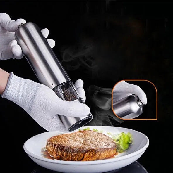 Stainless steel electric pepper grinder with natural colour finish