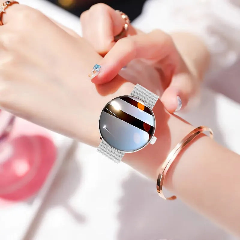 Smart watch for women with colour screen, aluminium alloy case, and metal strap in black, gold, or silver steel.