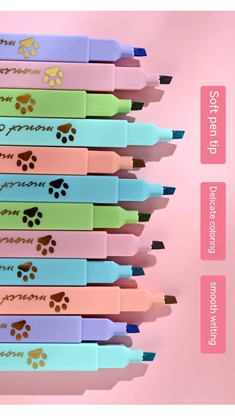Box of six cat's paw fluorescent marking pens with oblique nib tips in assorted colours.
