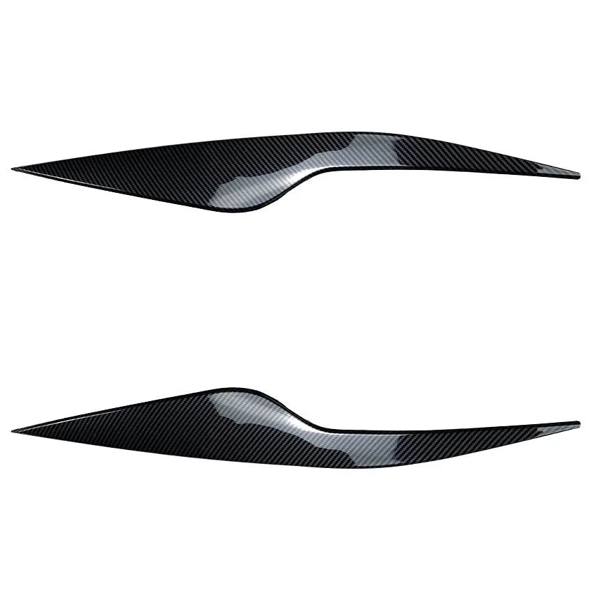 Ford Focus headlight eyebrow stickers in carbon fibre pattern and piano black finishes