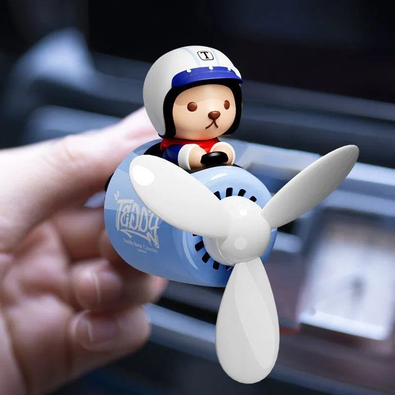 Blue plastic teddy bear-shaped car vent clip-on ornament with air freshener function