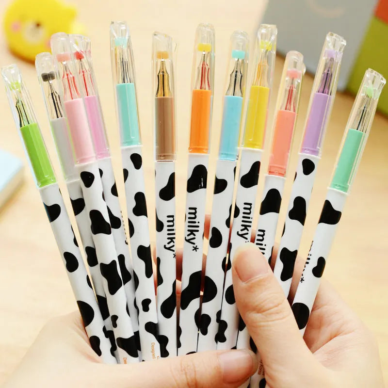 Cow colour gel pen with 0.38mm tip showing 12 different ink colours in plastic shells