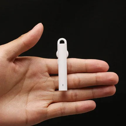 Compact black wireless Bluetooth headset showing 5.6cm length