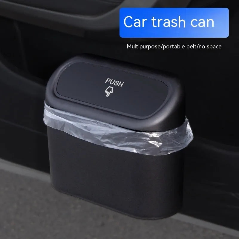 Black folding plastic trash can mounted on a car seat