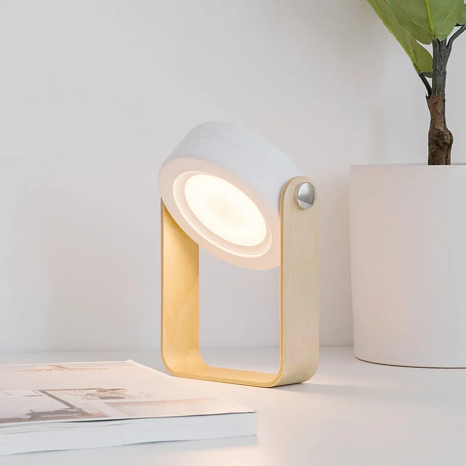 White foldable LED night light in table lamp mode with touch dimmer and USB port