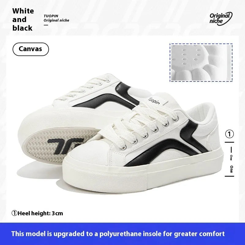 Women's low-top lace-up board shoes in synthetic leather with a vulcanised rubber sole.