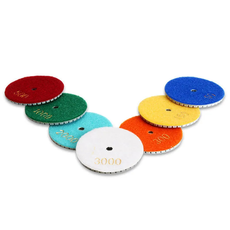 10-piece set of 80mm stone polishing pads with emery abrasive and 10mm centre holes