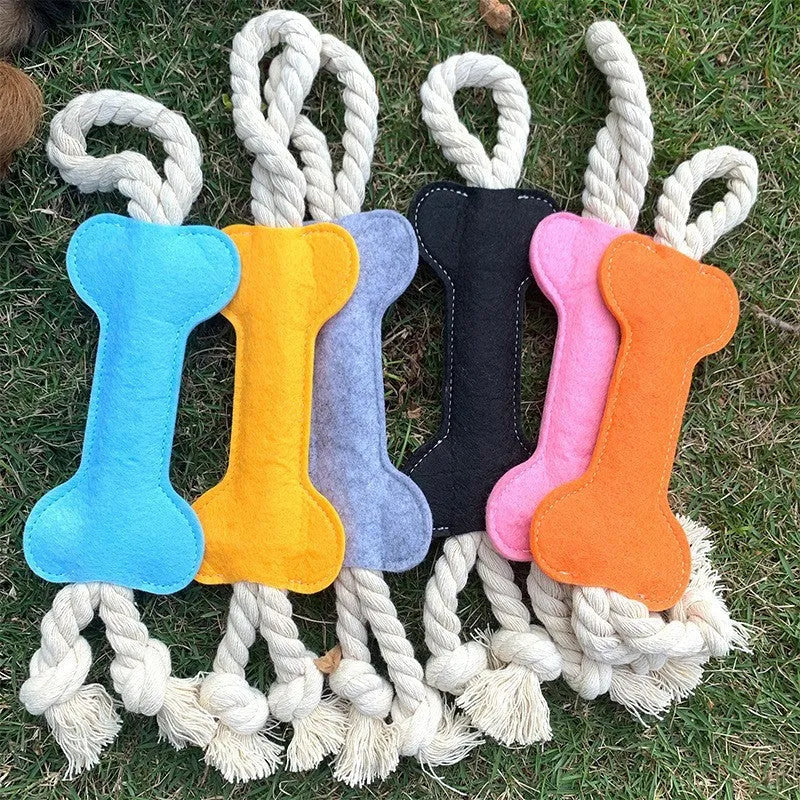 Bone-shaped dog toy with rope knots in felt construction, measuring 16cm by 7cm