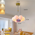 Nordic-style gold chandelier with multiple bubble-shaped lampshades and LED lights