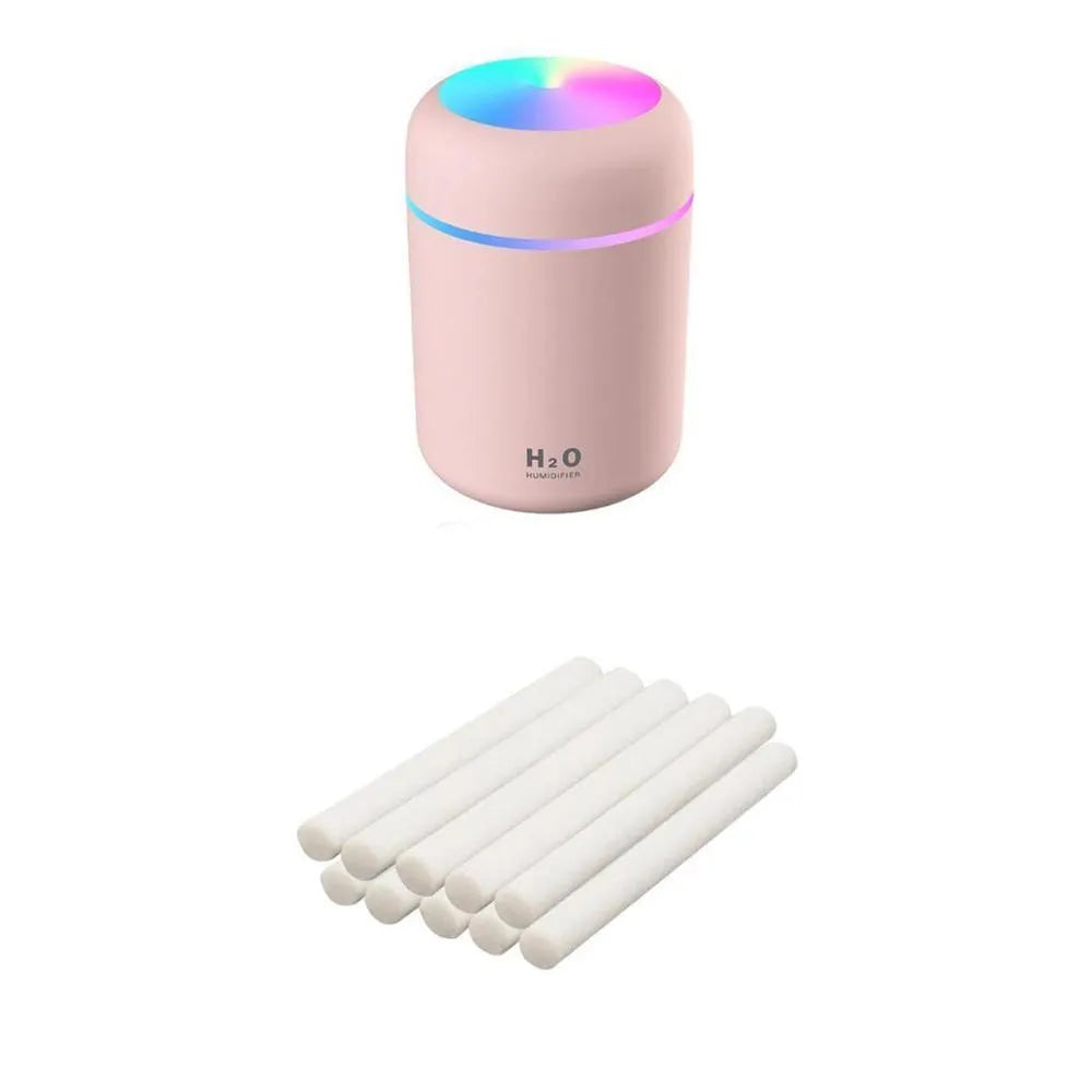 Pink USB desktop humidifier with 300ml water tank and adjustable mist control