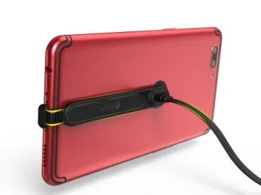 L-shaped gaming phone charging cable with white suction cup attached to a mobile phone.