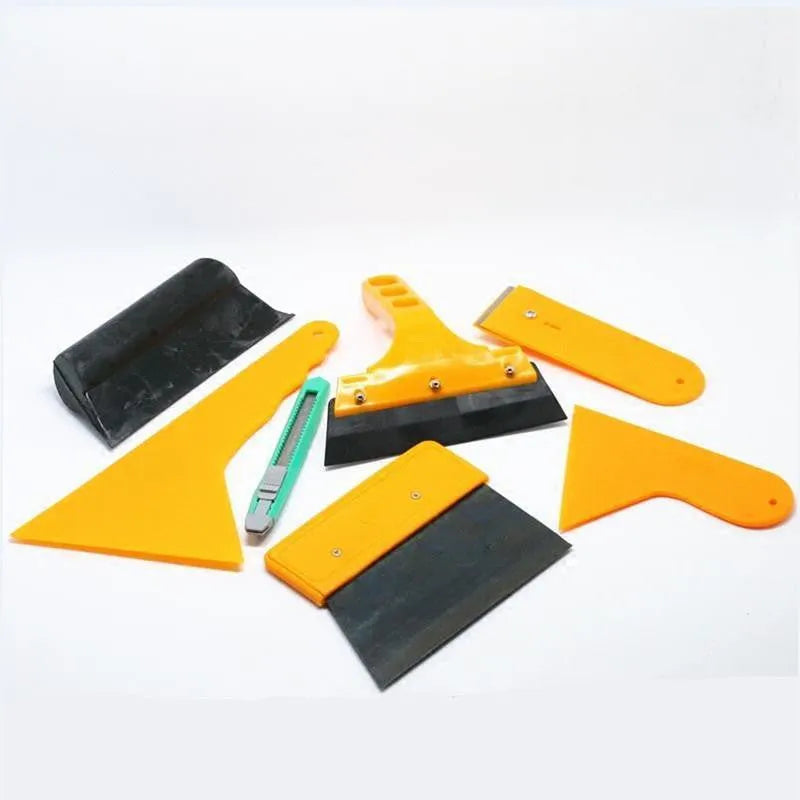 Seven-piece car foil tool set including scrapers, knives, and pressing block for film application