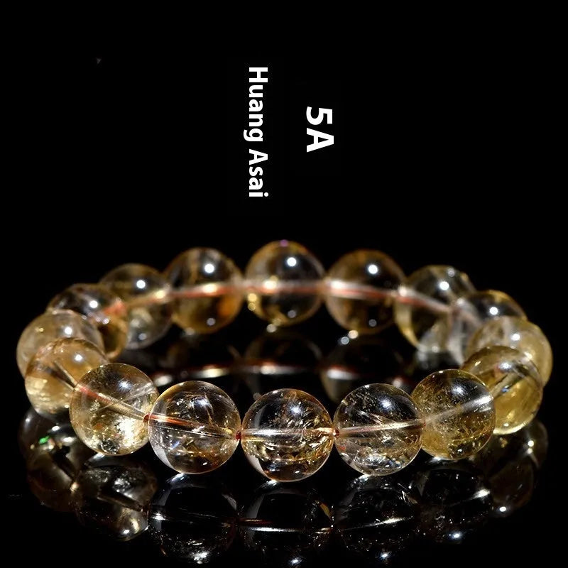 Natural yellow citrine bracelet with geometric beads in Brazilian yellow and violent yellow hues, showing single-circle design