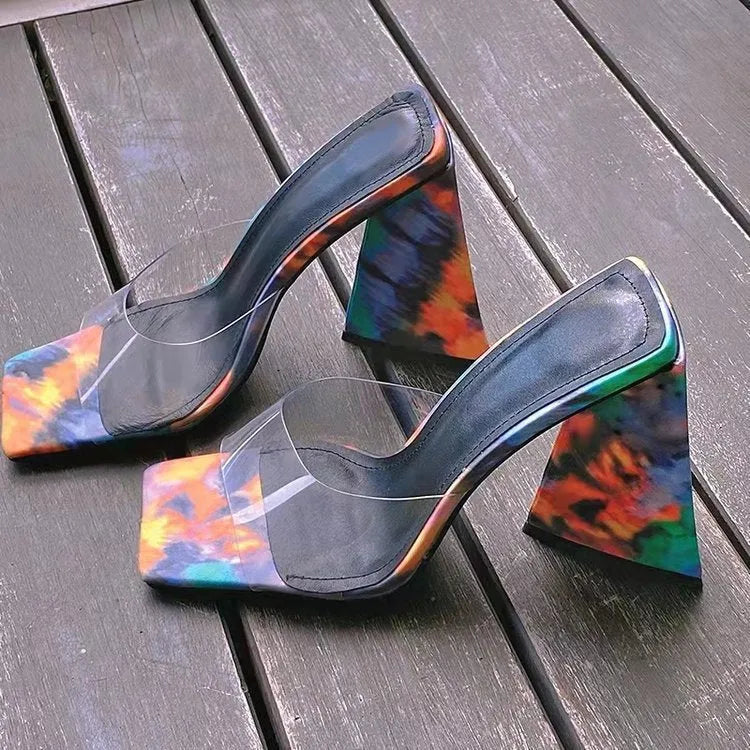 Women's black square toe high heel slippers with a thick triangular block heel on a rubber sole.