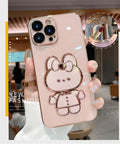 Cartoon rabbit stand mirror phone case for Apple iPhone, TPU electroplated anti-fall cover, pink bracket