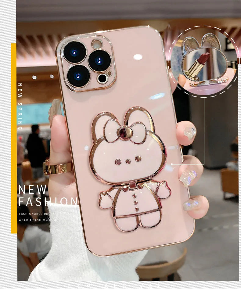 Cartoon rabbit stand mirror phone case for Apple iPhone, TPU electroplated anti-fall cover, pink bracket