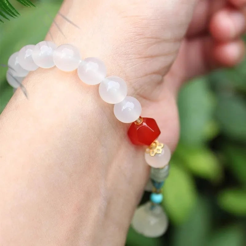 Hand-woven natural white agate bracelet with Chinese lotus seedpod design and 10mm geometric beads