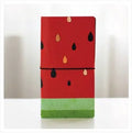 Japanese-style notebook with hand-painted cartoon illustration cover showing cat design