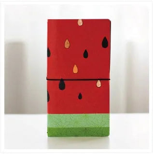 Japanese-style notebook with hand-painted cartoon illustration cover showing cat design