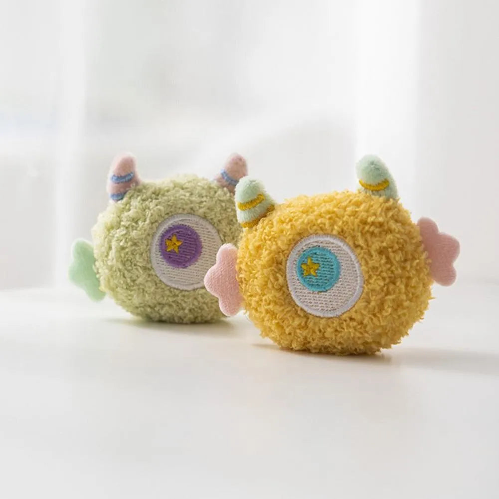 Cartoon-shaped plush dog toy with large eyes and squeaker in grey, green, pink, white or yellow