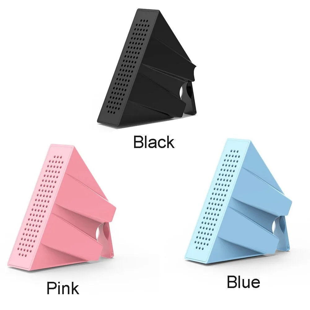 Pink ABS mobile phone amplifier bracket holding iPhone horizontally on desktop