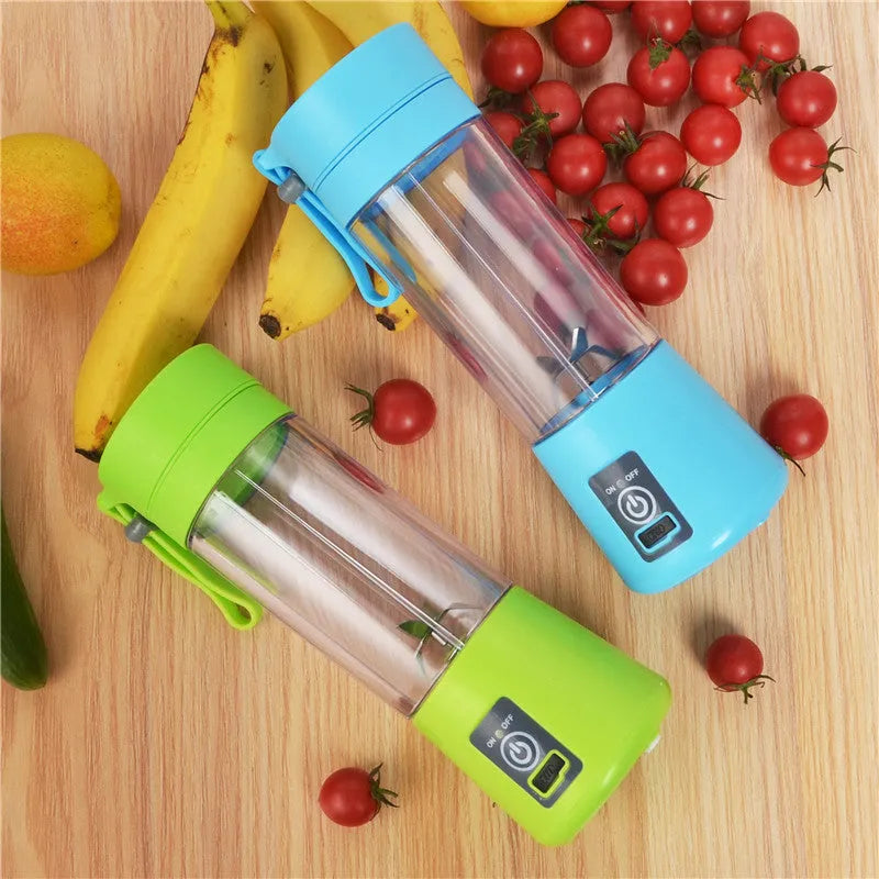 Mini USB electric fruit juicer in pink with stainless steel blade and carry rope