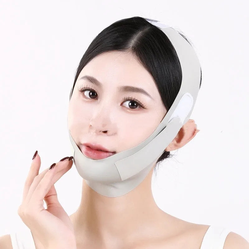 Green and purple lightweight V face shaping mask for facial lifting and tightening.