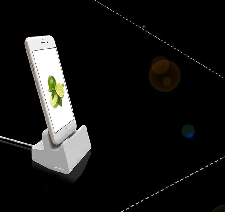 White headphone charging base station with fashion last design on flat surface