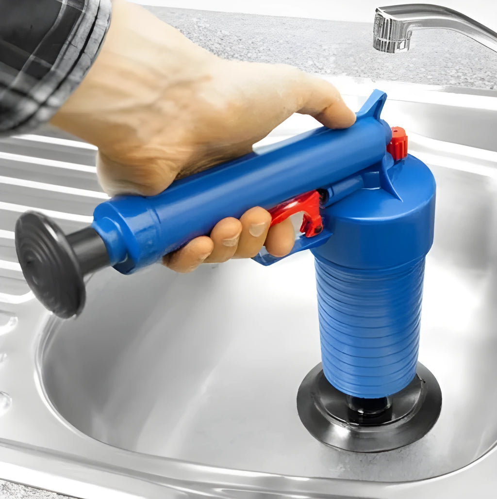 Plastic manual drain blaster gun with four different sized plastic sucker adaptors for unblocking pipes