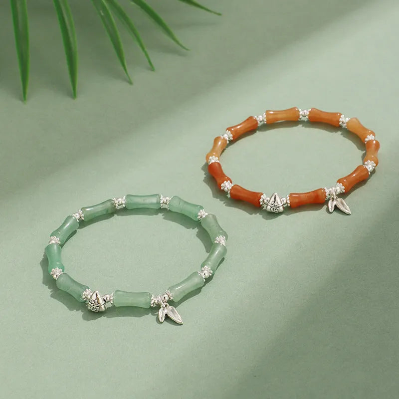 Green Aventurine bamboo crystal bracelet with multiple gemstones including strawberry quartz and olive jade